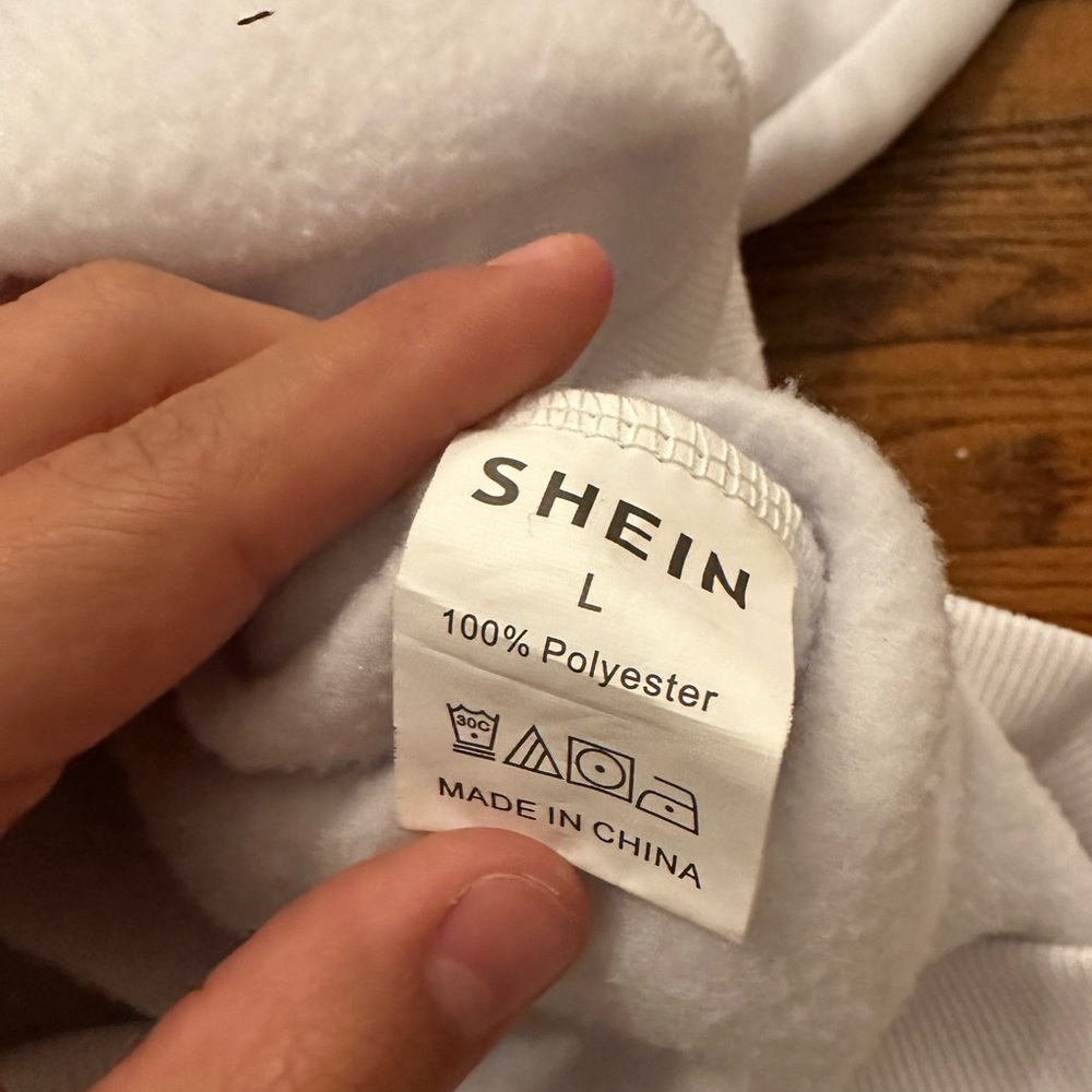 Shien white sweatshirt size large in pretty good condition